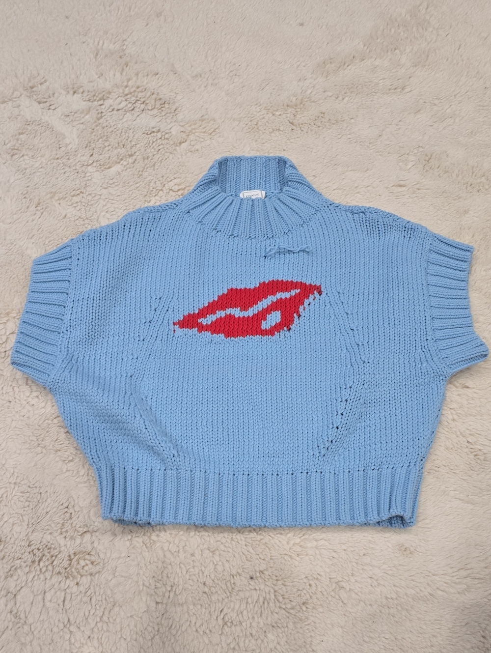 Maeve Light Blue Cropped Turtleneck Sweater with Red Lip Motif